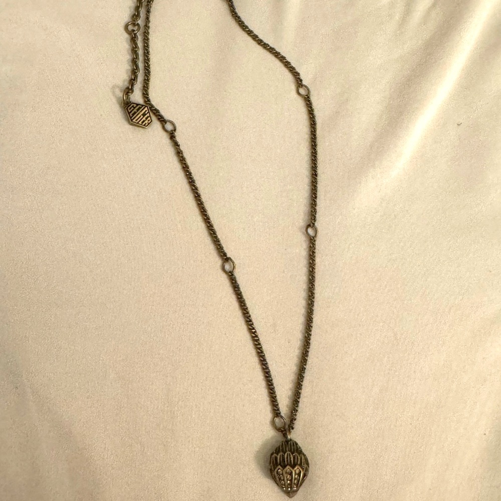 Kurt Geiger Antique Gold Pendant Necklace with Decorative Charm
